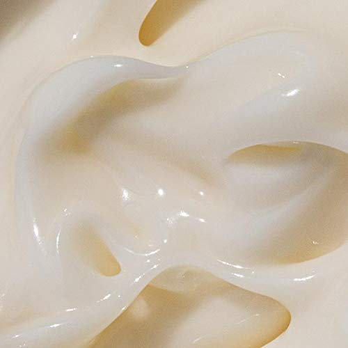 Moon Juice Cosmic Cream on vanity with size reference showing travel-friendly 1.7oz