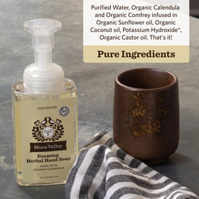 Moon Valley Organics foam texture on hands demonstrating gentle cleansing