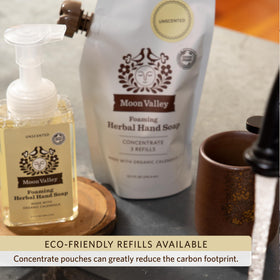 Moon Valley Organics in-use at kitchen sink demonstrating gentle cleansing and fresh scent benefit