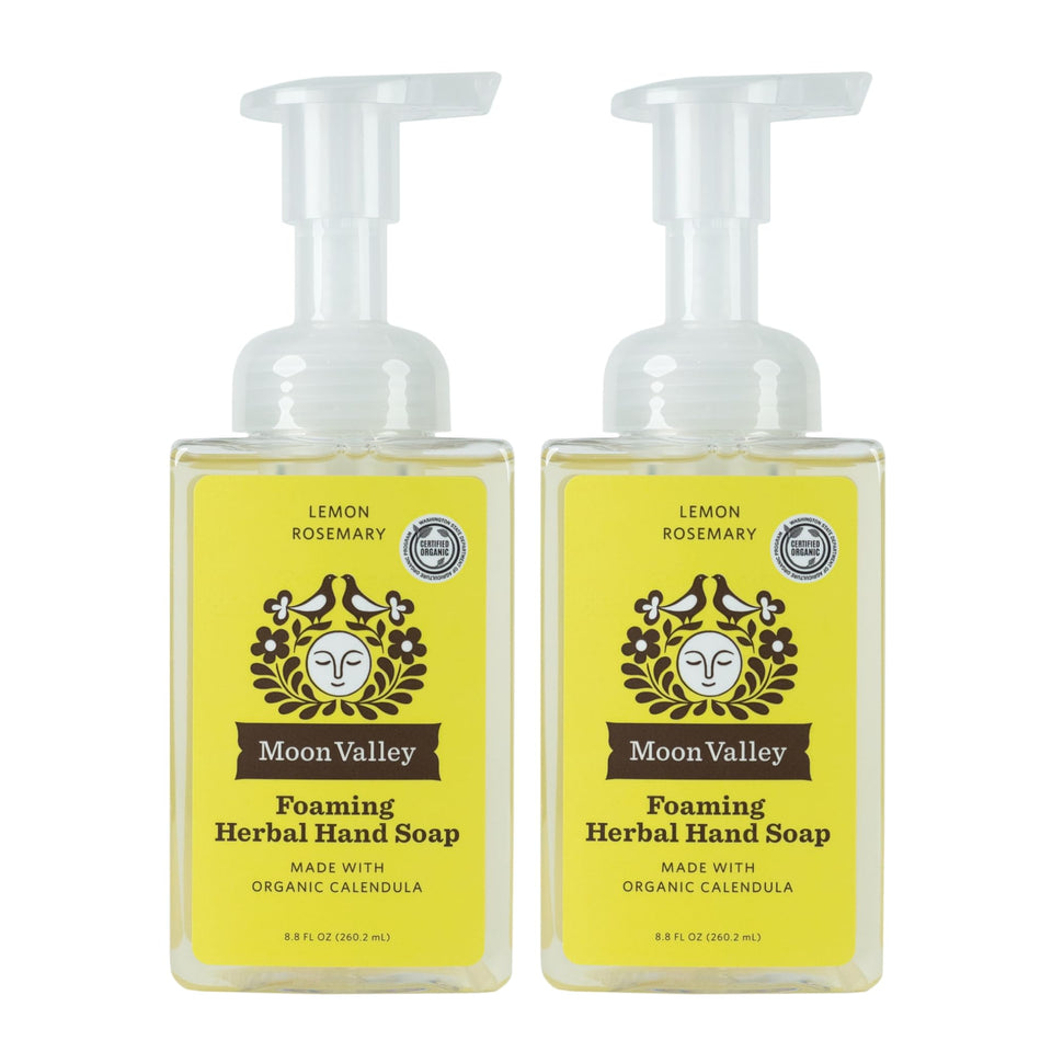 Moon Valley Organics front packaging showing two bottles and bright lemon-rosemary scent benefit