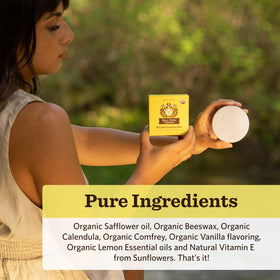 Moon Valley Organics bar being rubbed on hand to moisturize dry skin
