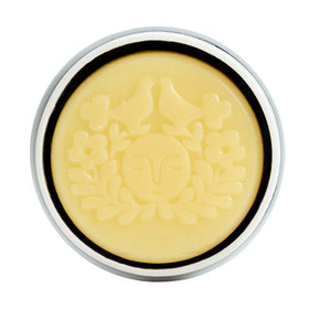 Moon Valley Organics on a bathroom shelf with towel showing everyday use