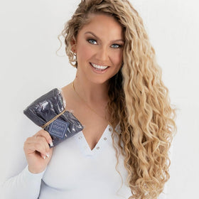 MoonstoneSeven hair plop on model in bathroom for comfortable styling benefit