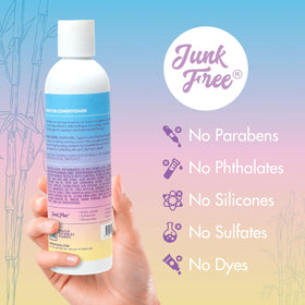MopTop applied to curly hair showing defined, moisturized curls and reduced frizz