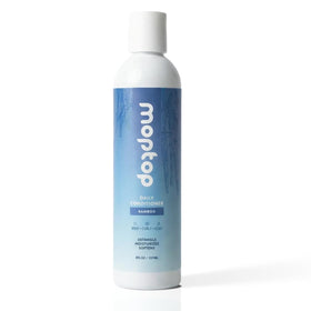 MopTop front bottle view showing natural formula benefits
