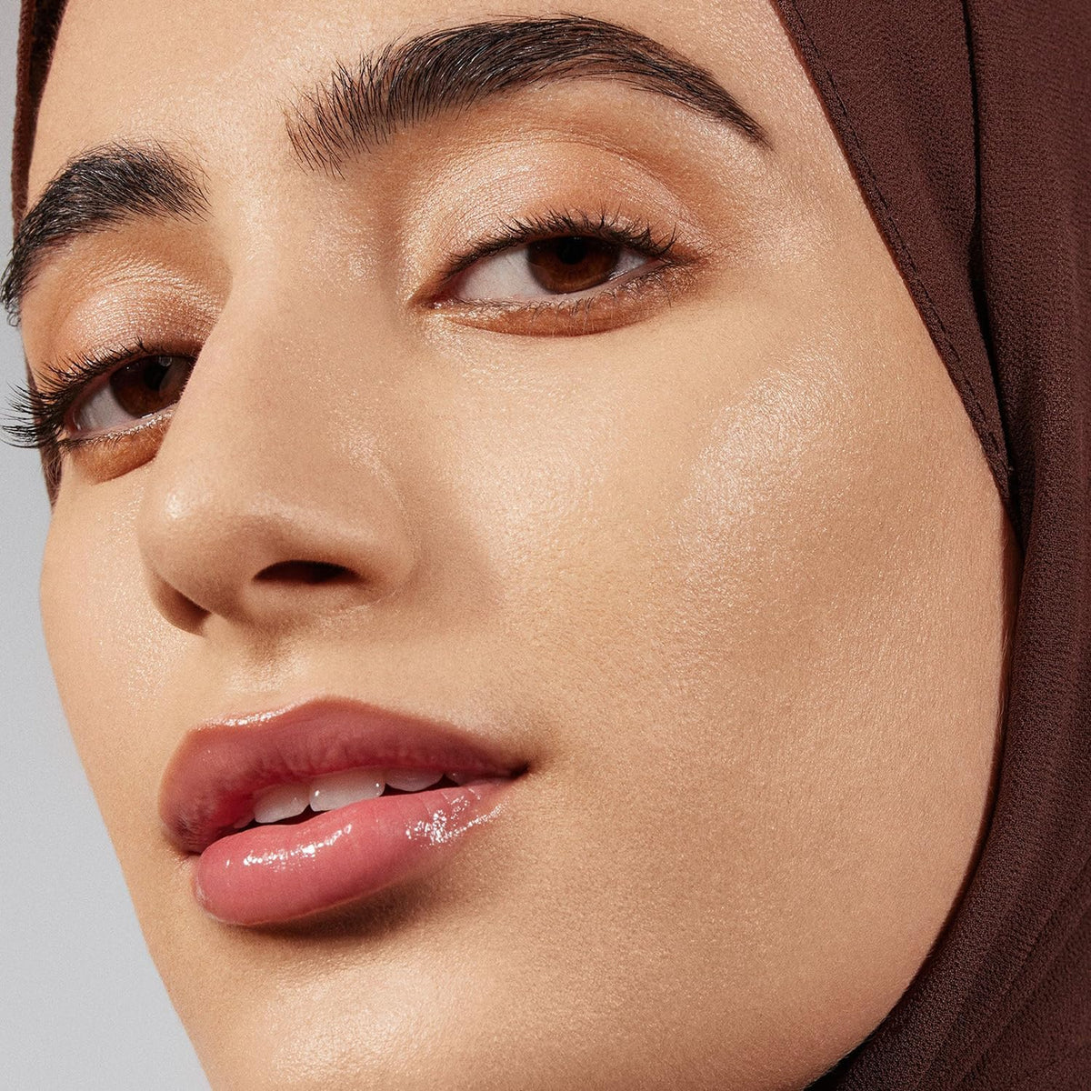 MORPHE foundation droplet on skin showing smooth texture and hydration