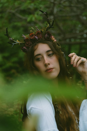 MOSTORY detailed shot of artificial flowers and moss for woodland aesthetics