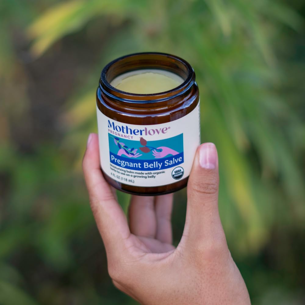 Motherlove jar in hand displaying 4 oz size for scale and portion clarity