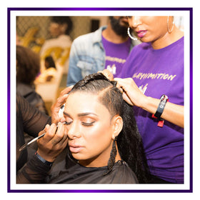 motions Motons in a salon with stylist applying product illustrating professional use