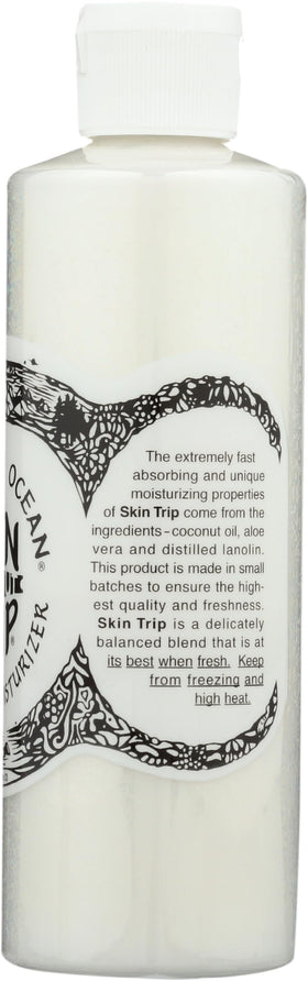 Mountain Ocean applying moisturizer to elbow demonstrating soothing hydration benefits