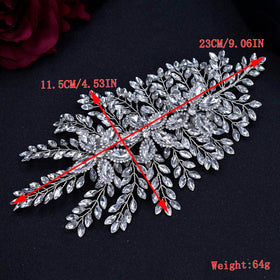 Mpoikba bridal portrait outdoors showing headband enhancing wedding look
