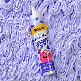 Mr. Bubble size comparison in hand showing 8 oz travel‑friendly benefit