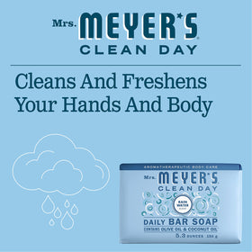 Mrs. Meyer's bar soap in hand demonstrating size and easy-to-grip, long-lasting bar