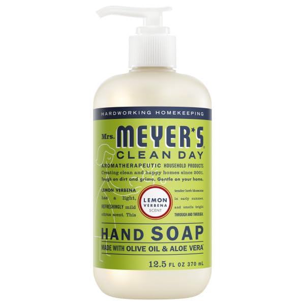 Mrs. MEYER'S bottles staged by a kitchen sink showing refreshing scents for home