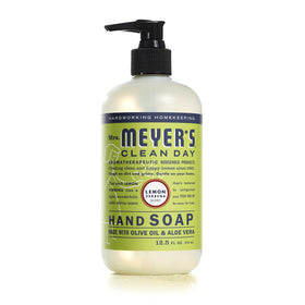 Mrs. MEYER'S bottles held in hand showing size and easy dispensing benefit