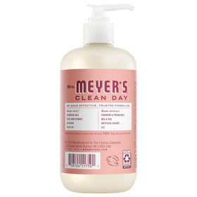 Mrs. MEYER'S Daisy bottle placed by a bathroom sink creating an inviting, uplifted atmosphere