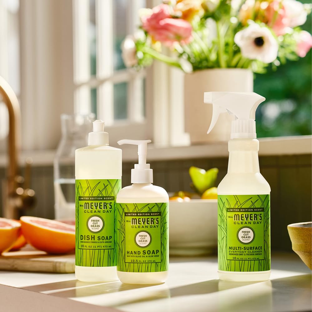 Olive leaf and aloe display highlighting Mrs. MEYER'S plant-derived ingredient focus