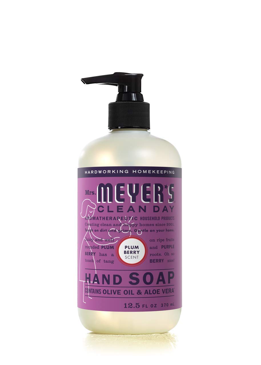 Mrs. Meyer's Plumberry bottle label visible emphasizing fruity scent and household freshness benefit