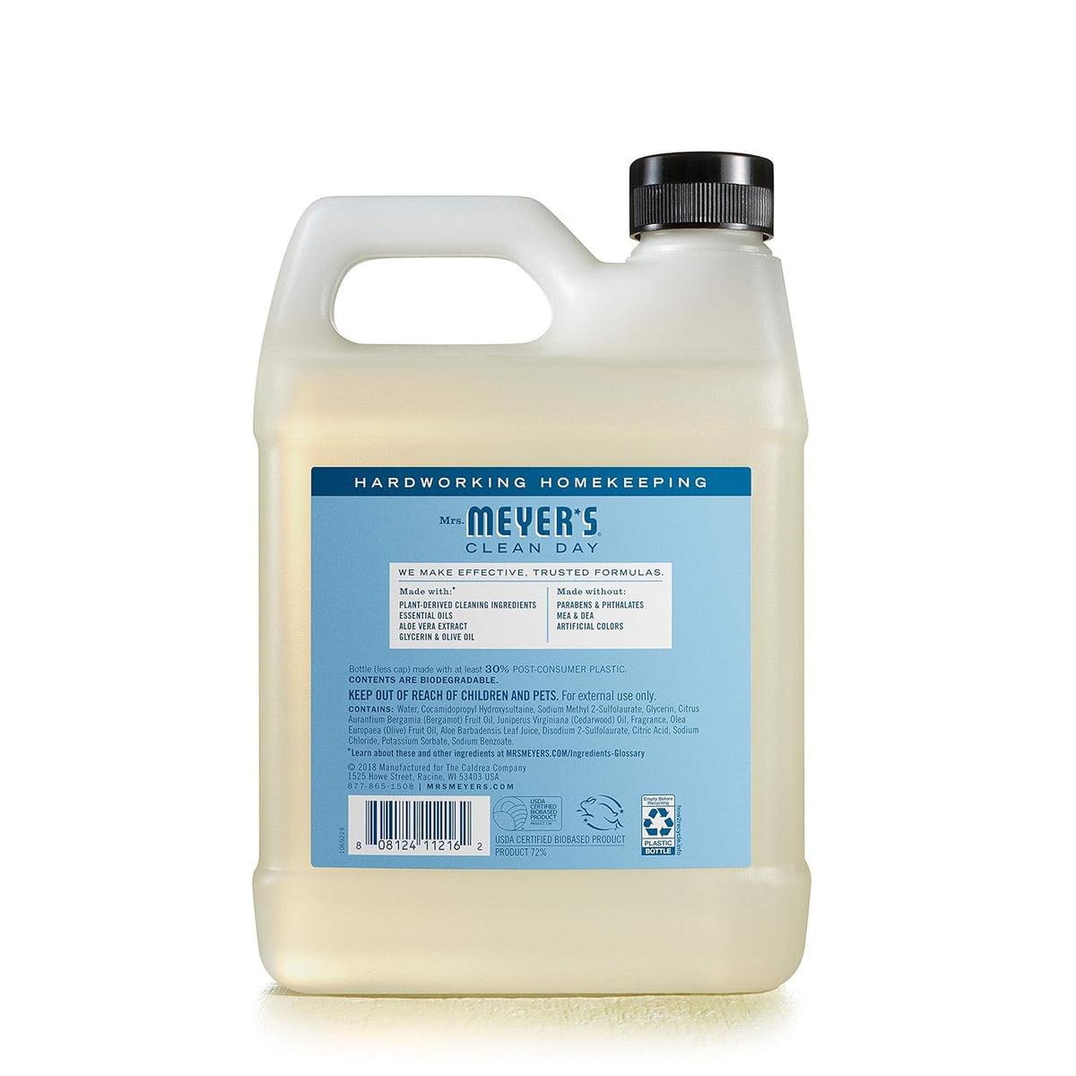Mrs. MEYER'S pouring refill into pump bottle demonstrating waste-reduction benefit