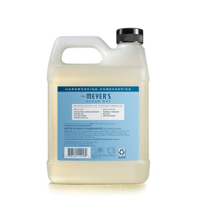 Mrs. MEYER'S pouring refill into pump bottle demonstrating waste-reduction benefit