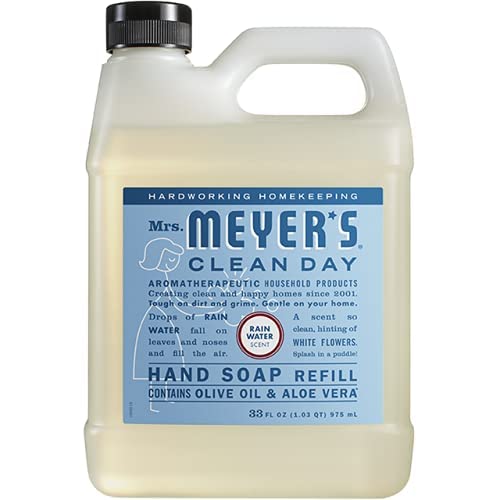Mrs. MEYER'S pouring refill into dispenser demonstrating easy refill