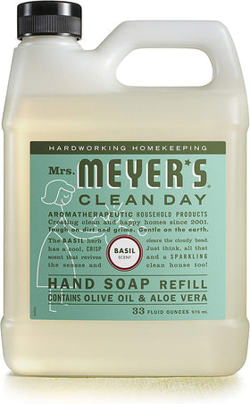 Mrs. MEYER'S refill pouring into a dispenser illustrating easy refill benefit