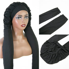 MsFan bonnet folded beside ruler showing size and easy travel convenience