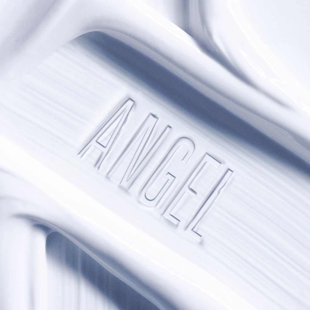 Mugler angel frosted jar detail highlighting sparkling shooting star for an artful vanity accent