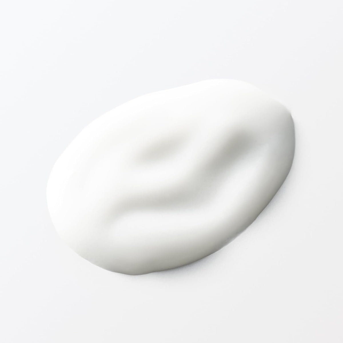 Muji 200ml bottle beside everyday items showing true size and value