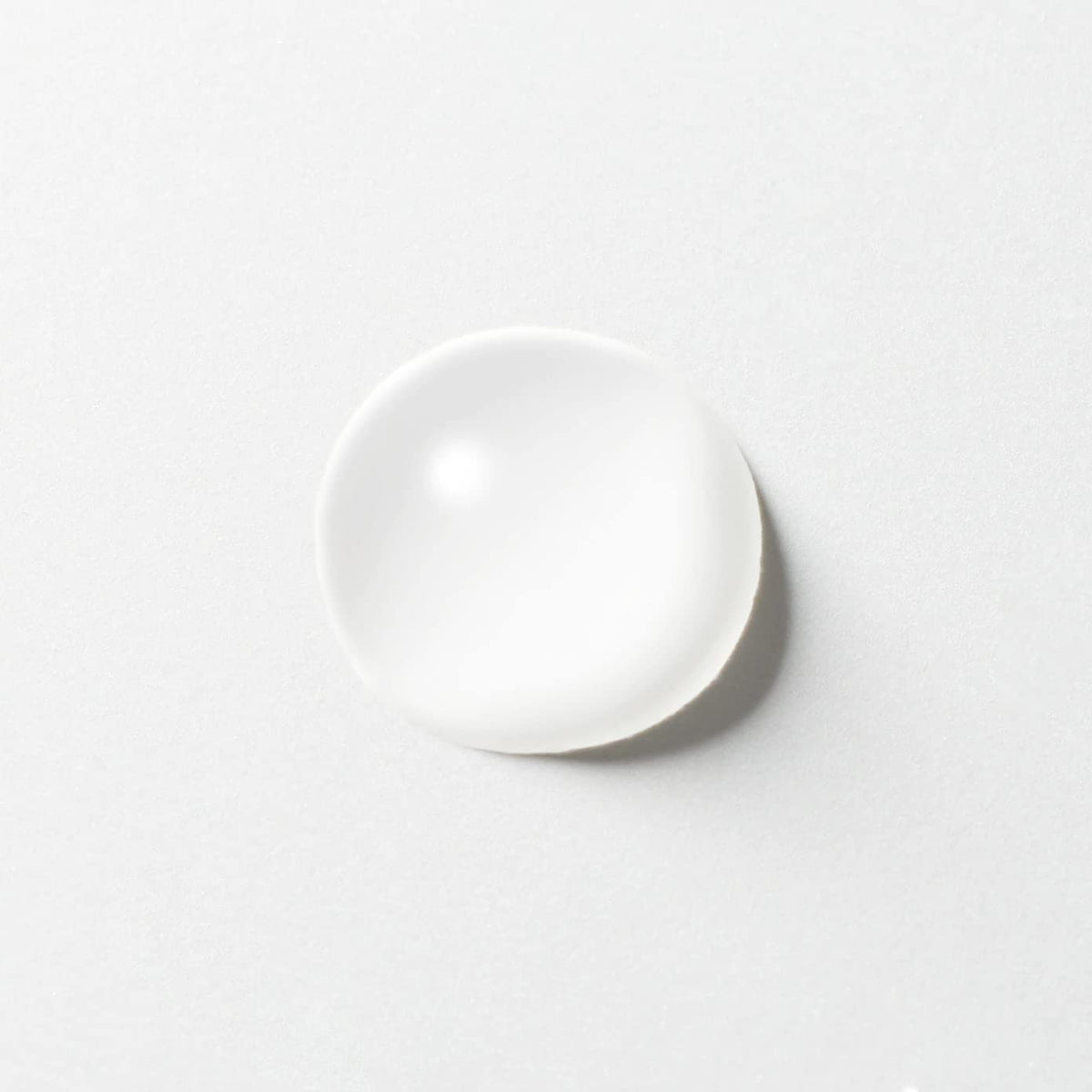 MUJI cleansing oil texture swirled on hand, shows lightweight spreadability benefit