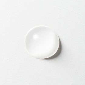 MUJI cleansing oil texture swirled on hand, shows lightweight spreadability benefit
