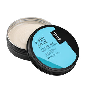 MUK. open jar close-up showing clay texture and smooth consistency for easy styling