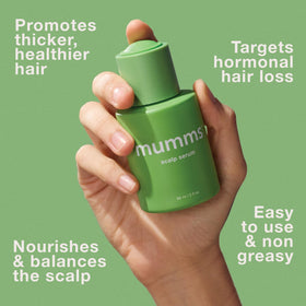 mumms bottle in hand demonstrating 2 fl oz size and travel-friendly benefit