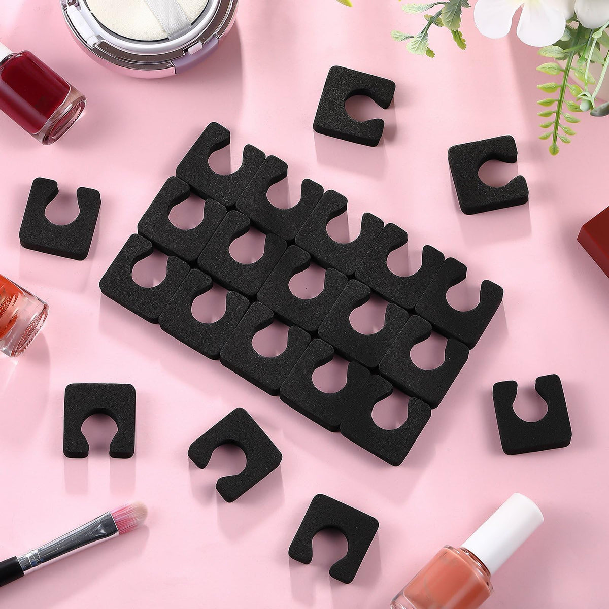 Mumufy separators placed between toes during pedicure for neat polish