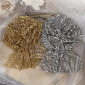 Munyee Hua mesh texture and sequin pattern highlighting light-reflective finish