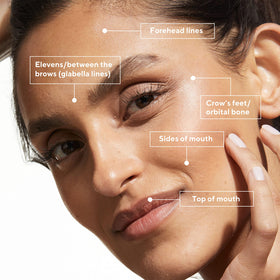 Murad 0.5 oz product beside coin showing scale and travel-friendly portability benefit