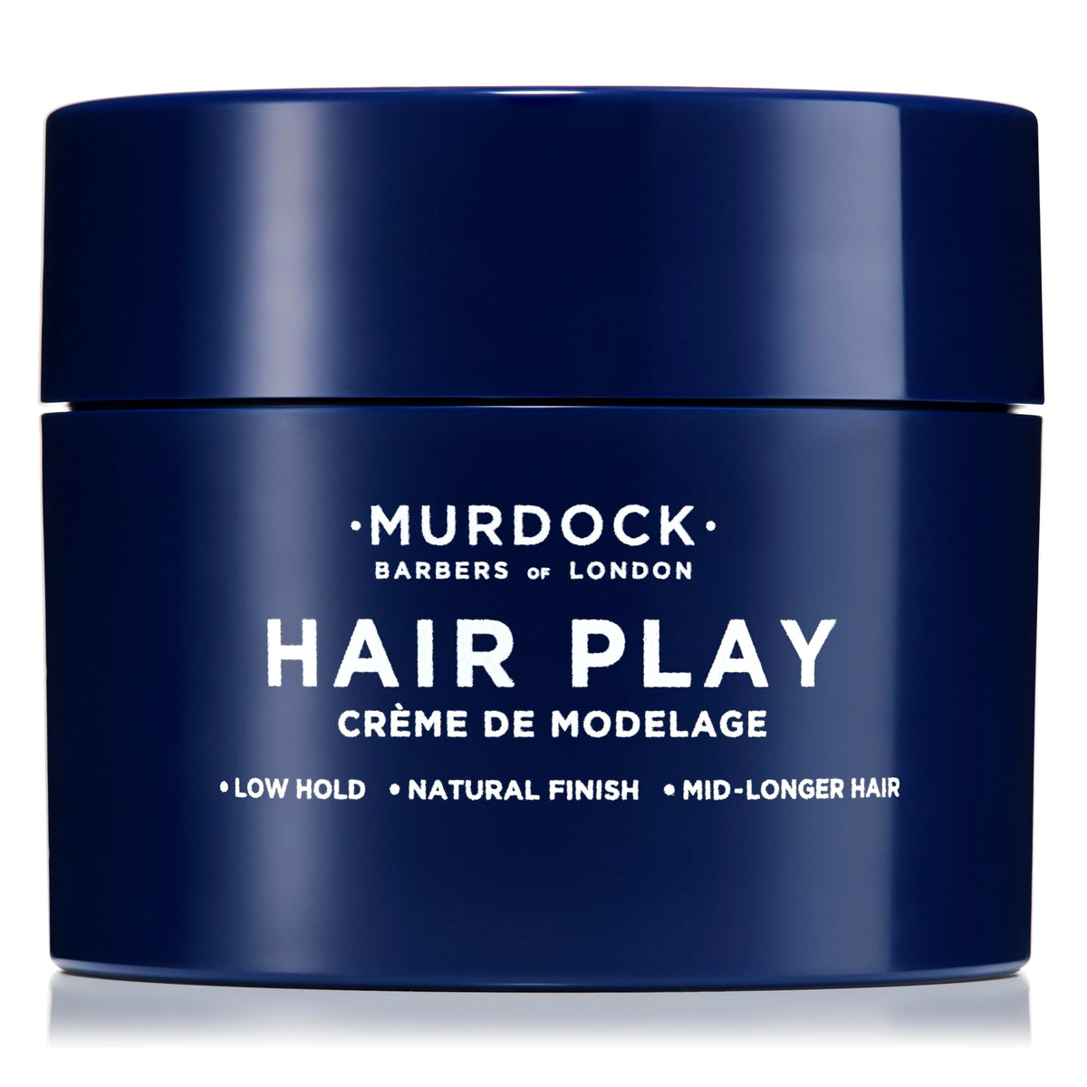 Murdock London paste being applied to hair for natural textured finish