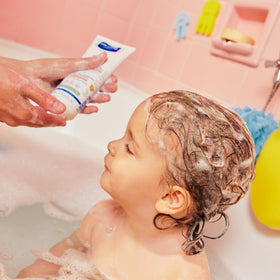 Mustela cream texture close-up illustrating silky glide and hydration