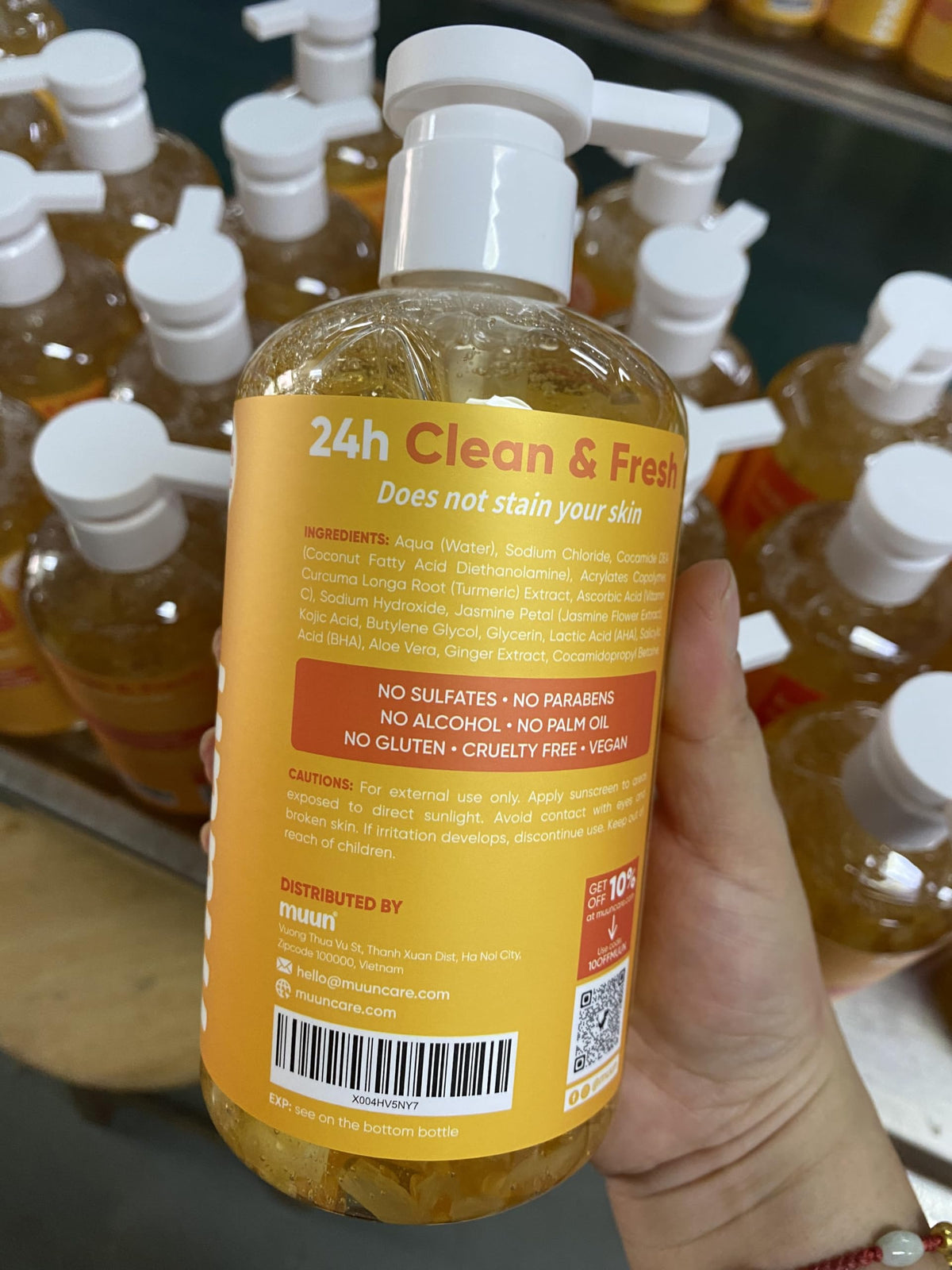 Muun bottle staged with ginger root suggesting soothing scent benefit