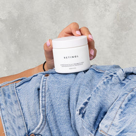 NAELI jar on bathroom vanity at night suggesting routine and restorative results
