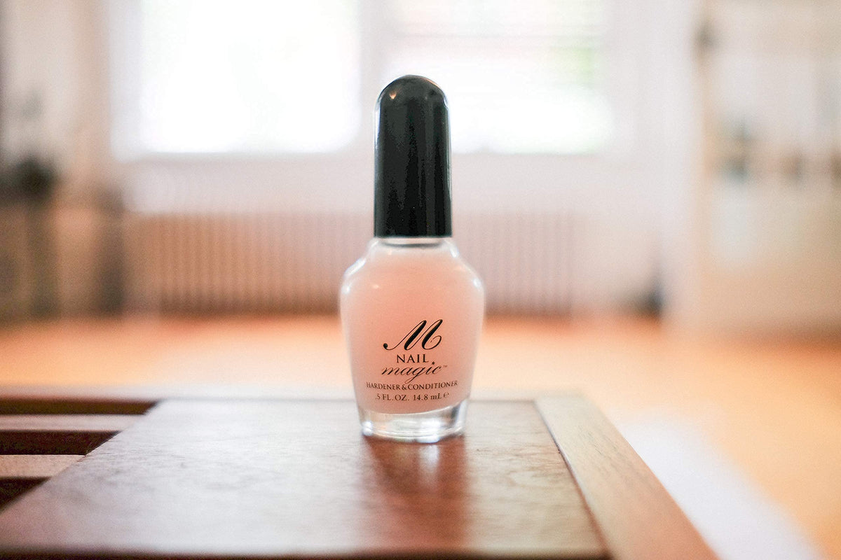 Nail Magic clear polish applied on nails improving resilience and shine