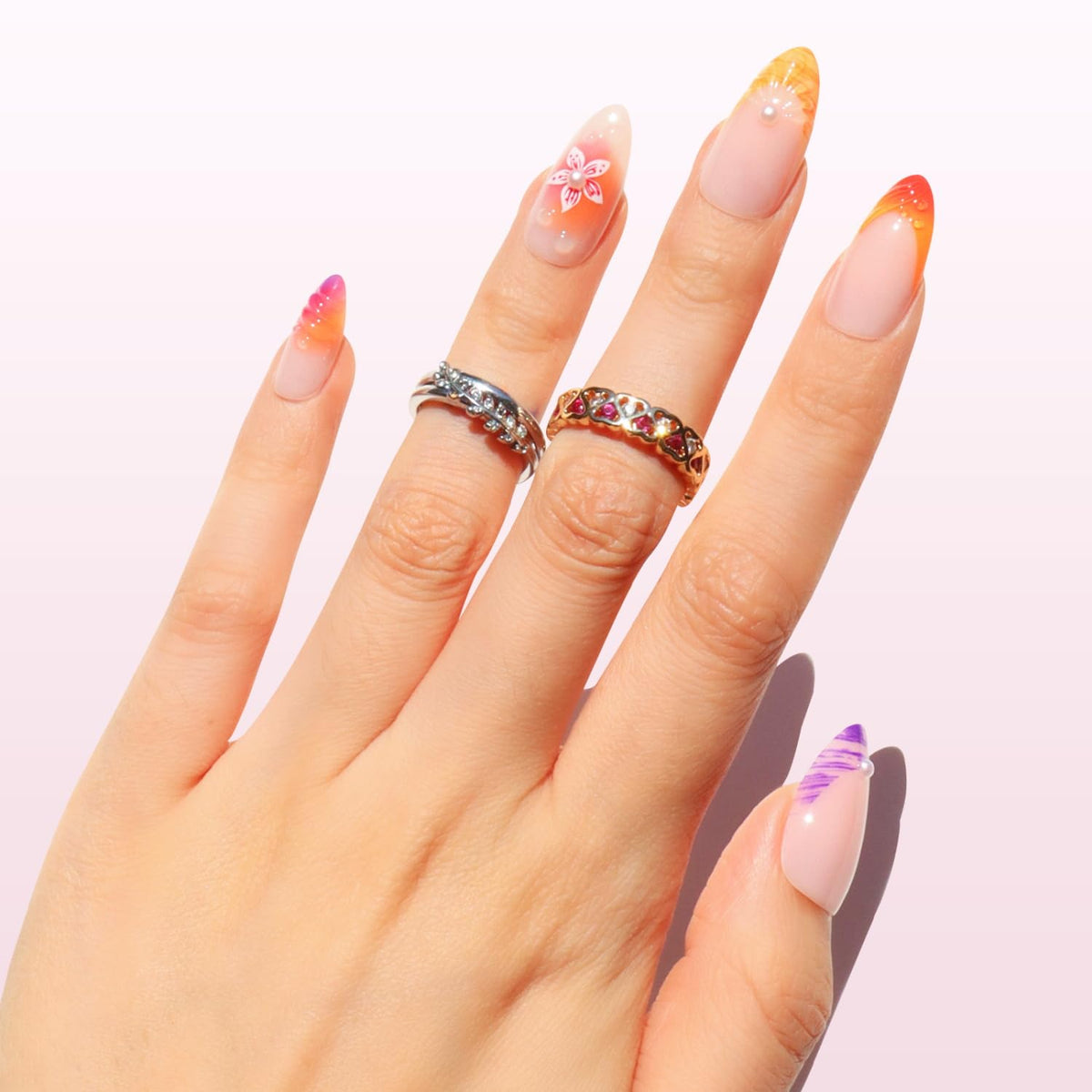 Nail Reformation macro of 3D floral accent highlighting textured design benefit