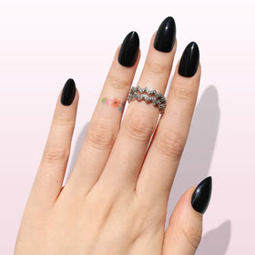 Nail Reformation short almond profile view demonstrating natural fit