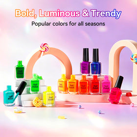 Nailshion flatlay with summer props showing festive, vacation-ready nail looks