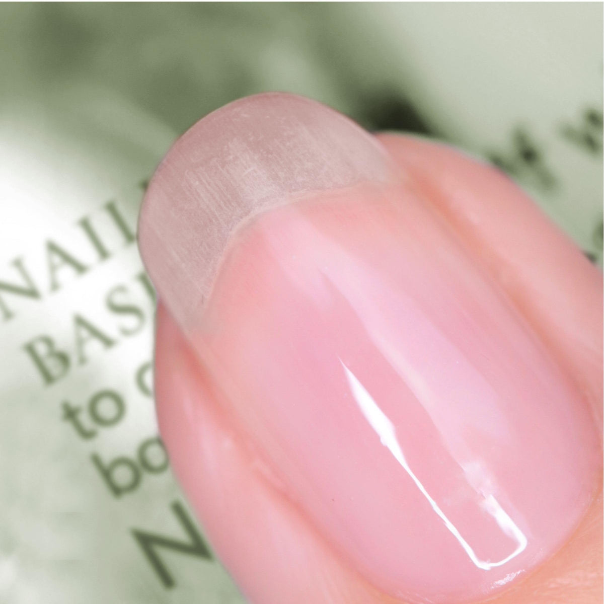 Nails Inc wooden cap close-up highlighting recyclable FSC beech eco-friendly cap