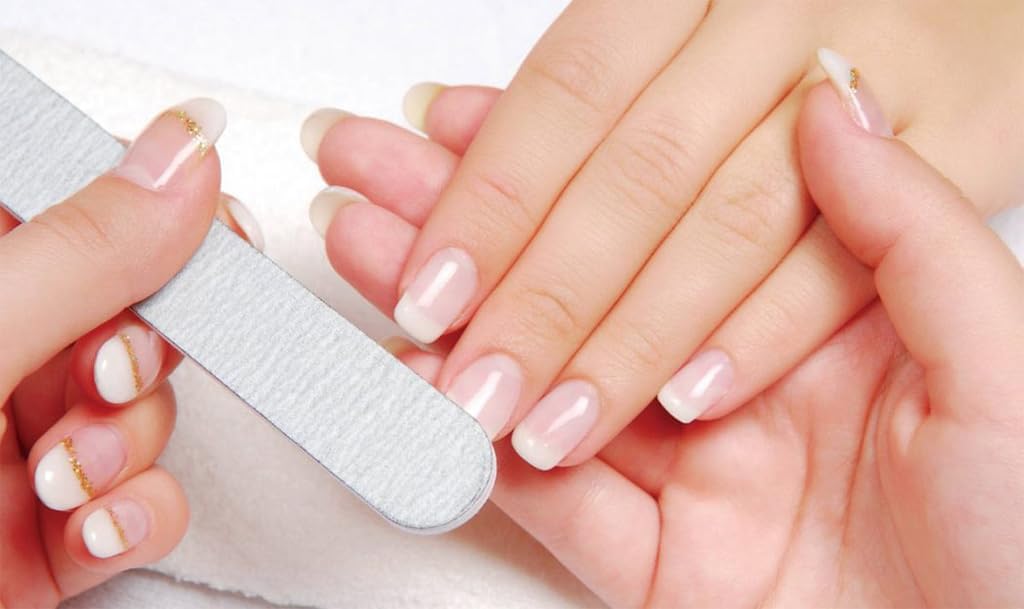 Nailtiques brush and cap close-up showing precision application benefit