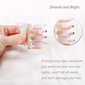 NAISIER clips held in hand for scale illustrating compact 2.3-inch size and portability