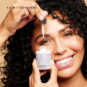Naked & Thriving in bathroom routine setting illustrating daily brightness benefit