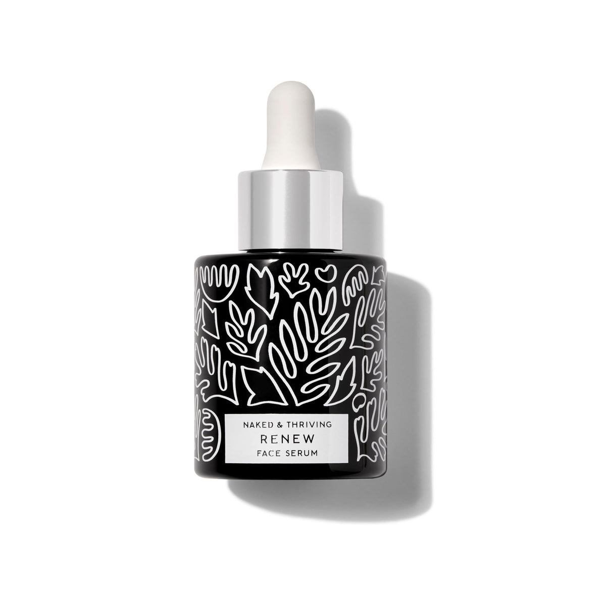 Naked & Thriving bottle on vanity portraying everyday routine integration