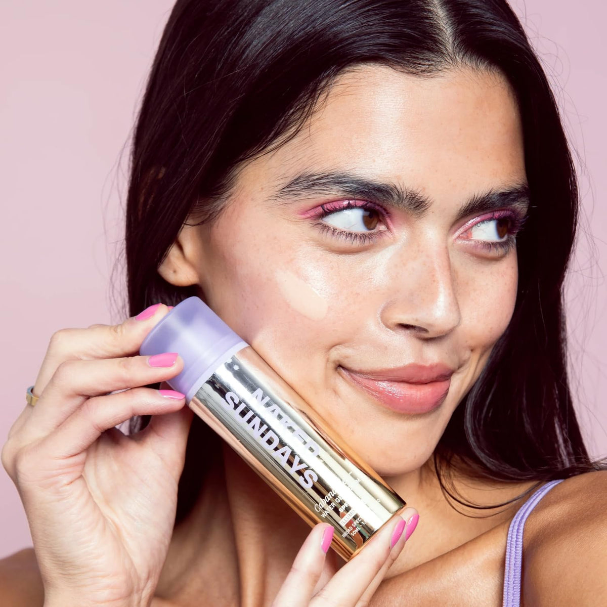 Application on hand showing quick absorption and radiant finish from Naked Sundays